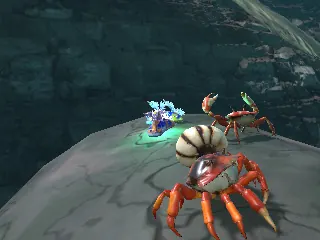 A hermit crab in a striped shell and a red crab on a rock